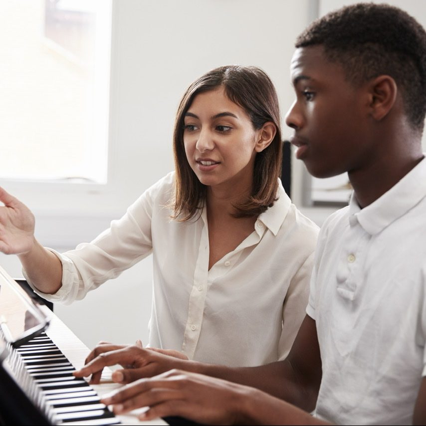 Vampr Pro Academy is a step-by-step guide to everything you need to know when stepping into the professional music arena! Music Lessons become life lessons! Male Pupil With Teacher Playing Piano In Music Lesson By monkeybusiness