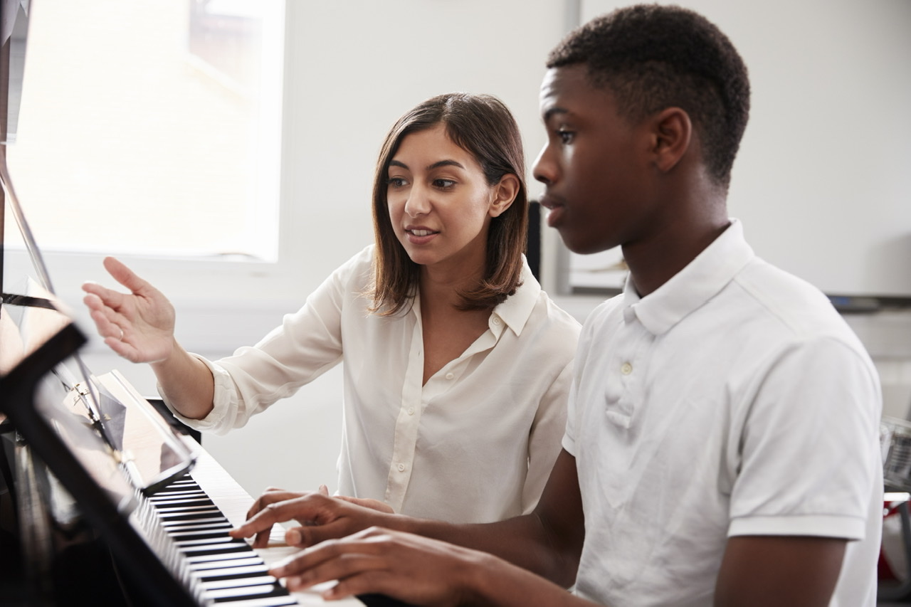 Vampr Pro Academy is a step-by-step guide to everything you need to know when stepping into the professional music arena! Music Lessons become life lessons! Male Pupil With Teacher Playing Piano In Music Lesson By monkeybusiness