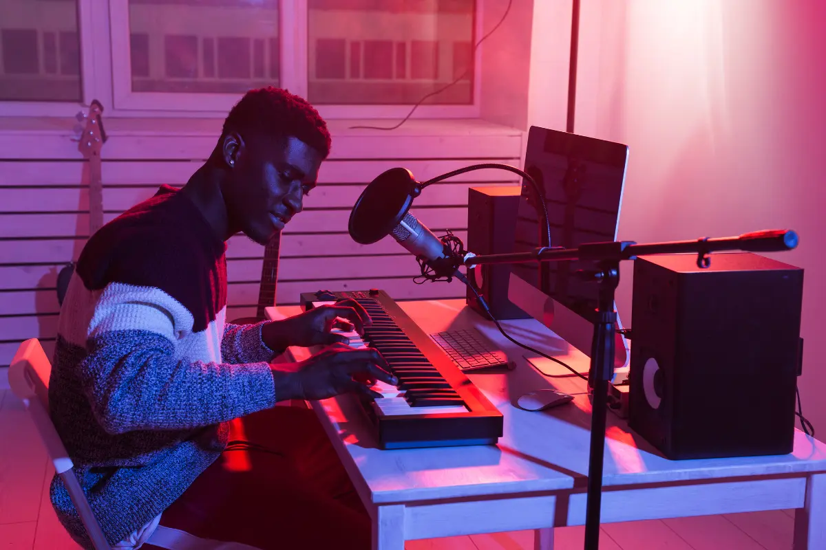 Music content for live streams created by a keyboardist producing and performing in a home studio setup